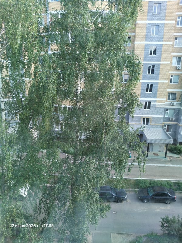 Multi-story apartment building observed in urban residential area