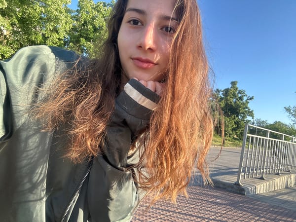 Person takes sunny afternoon selfie on bridge in Ruse