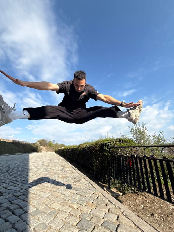 Man performs gymnastics, poses at overlooks in Shumen, Bulgaria