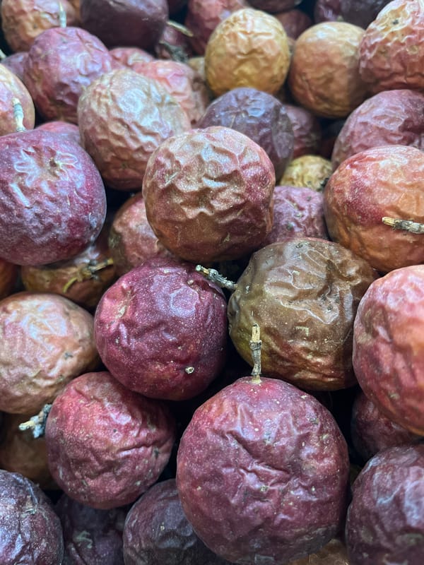 Tropical fruit market displays documented across unknown location