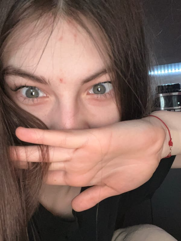 Woman captures playful selfies with cat in Saint Petersburg