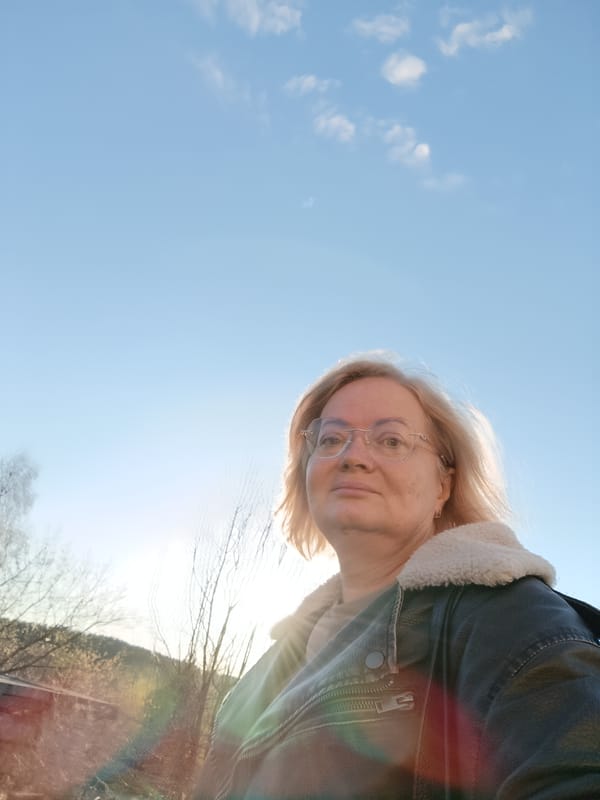 Woman photographed in bright sunlight in Большой Букор, Russia