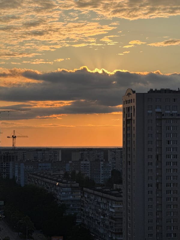 Sweeping sunset cityscape from high above
