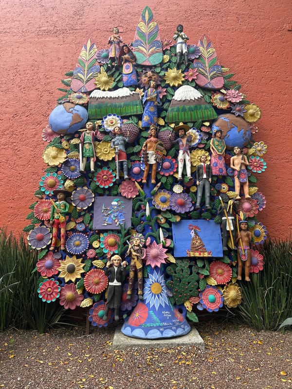 Visitor documents Mexican religious art and cultural artifacts