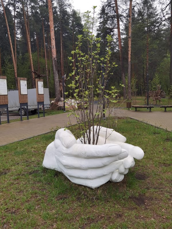 Family visits sculpture park with animal installations in Perm, Russia