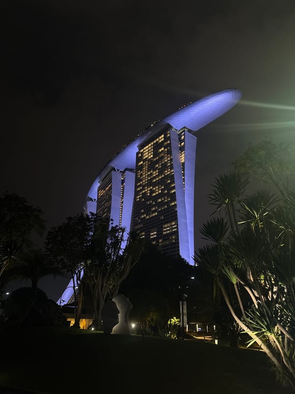 ArtScience Museum glows blue in Singapore nighttime scene