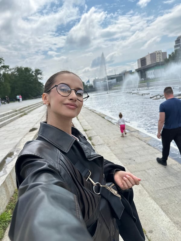 Morning stroll along Yekaterinburg's fountain-filled Iset River embankment