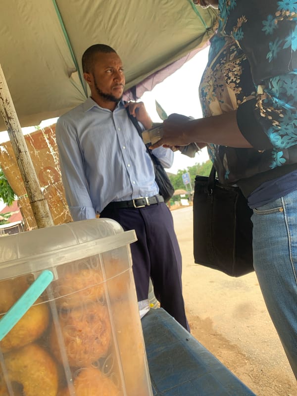 Everyday street life in Abuja on a weekday morning