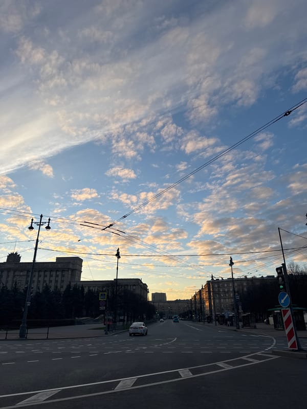 Saint Petersburg street scene captured with tram lines, cloudy sky