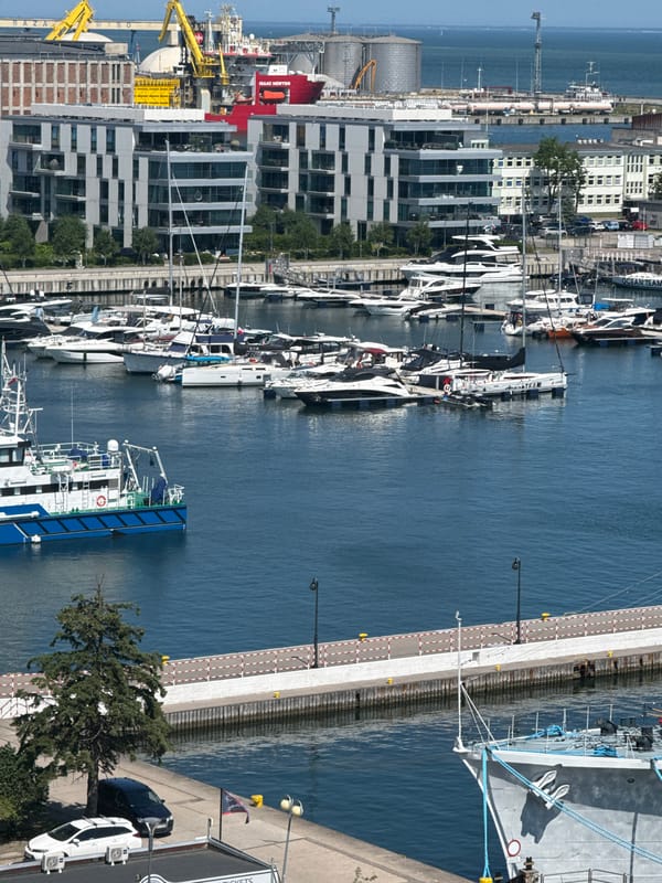 Gdynia waterfront, beach, and skyline on a summer morning