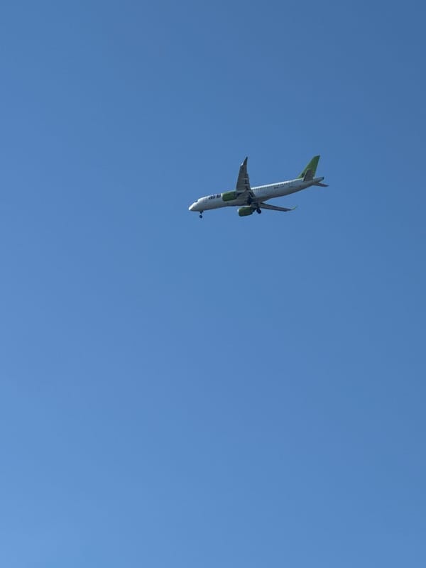 Aircraft performs aerobatic maneuvers over Tallinn in early morning