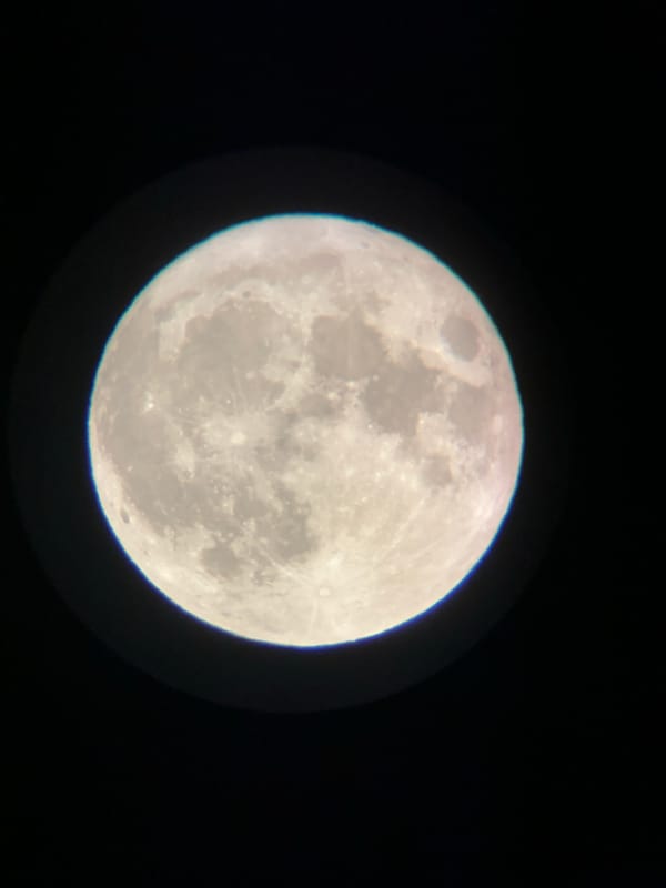 Full moon rising over Târgu Neamț, Romania