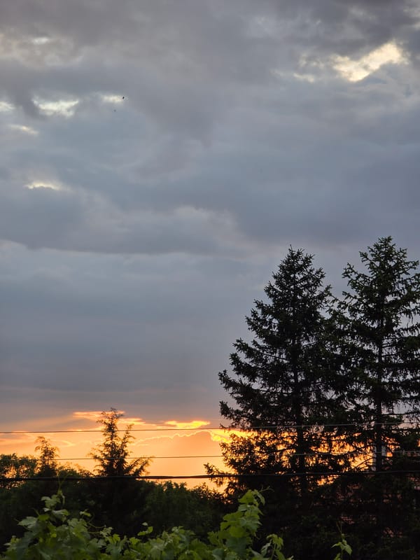 Sunset observed in Yagodovo, Bulgaria amid mixed cloud conditions
