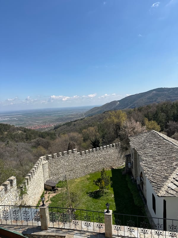 Woman visits historic stone ruins in Kuklen, Bulgaria