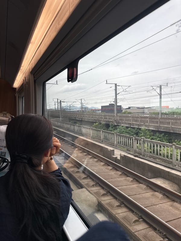 Train window view through Shangcheng District, Hangzhou
