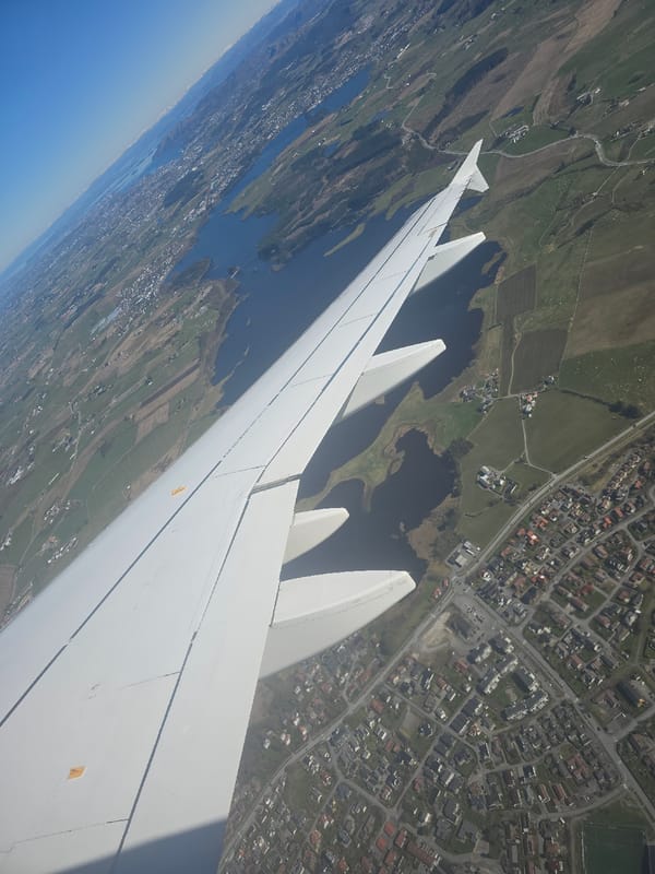 Aerial view captured from airplane window over Bryne, Norway
