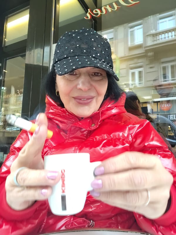 Morning café scene and playful cat captured in Strasbourg