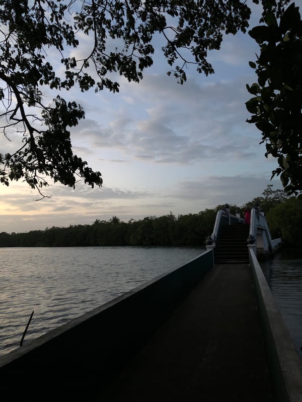 Waterfront shrines and calm lagoon views in Habaraduwa