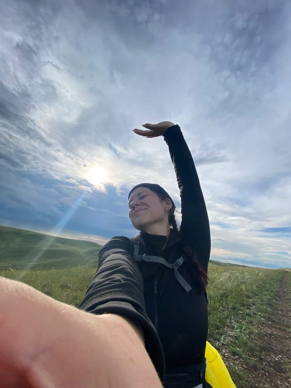 Hiking selfies across rolling hills in Verkhneozernoe, Russia