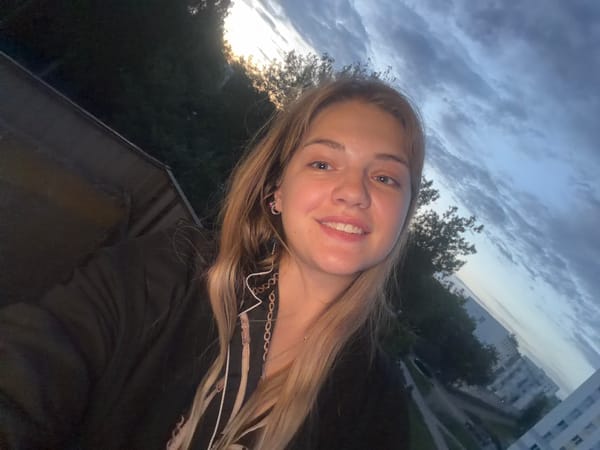 Woman documents evening stroll with selfies and cats in Russia