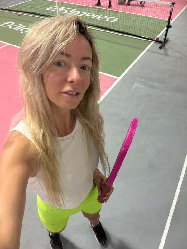 Pickleball session on a pink court in Da Lat, Vietnam