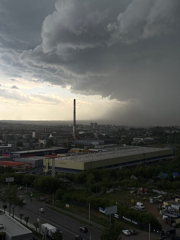 Storm clouds gather over Izhevsk as residents document weather indoors