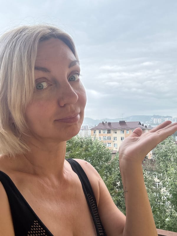 Balcony views and a selfie at a Sochi resort courtyard