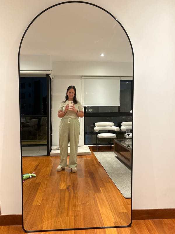 Woman takes mirror selfie in Miraflores apartment