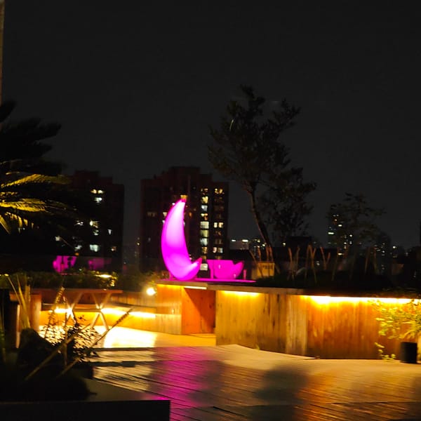 Colorful crescent light displays illuminate Yuzhong District night skyline