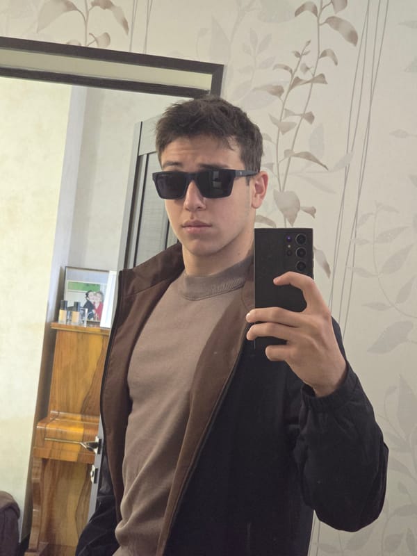 Young man takes selfie indoors in Yerevan, Armenia