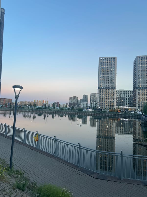 Evening stroll along Astana's waterfront promenade