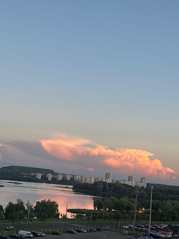 Sunset over the Svislach River, Minsk, crescent moon rising