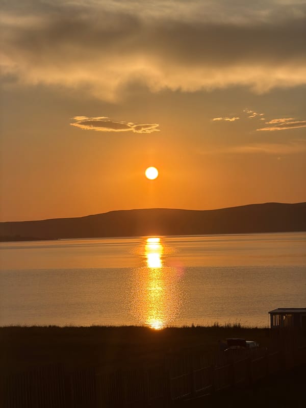 Lakeside grilling and sunset at a Russian surf camp