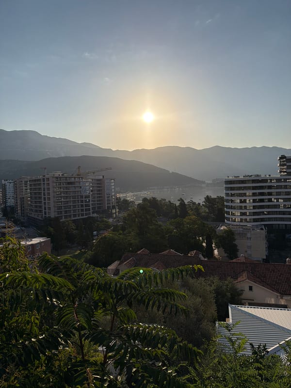 Rooftop golden hour over Budva's Adriatic coastline