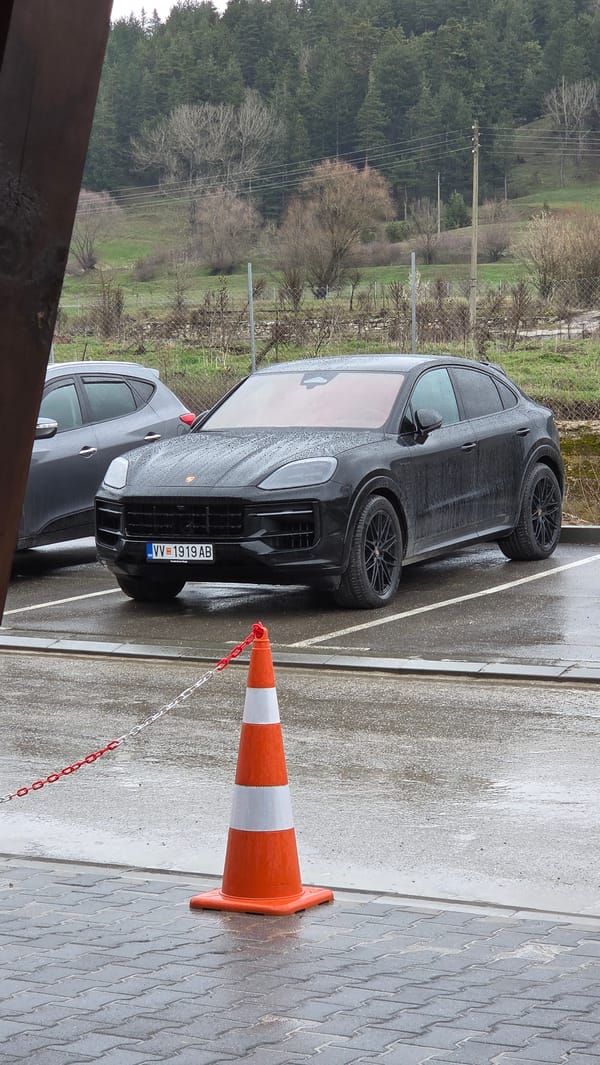 Luxury SUV parked during rainy weather in Bulgarian town