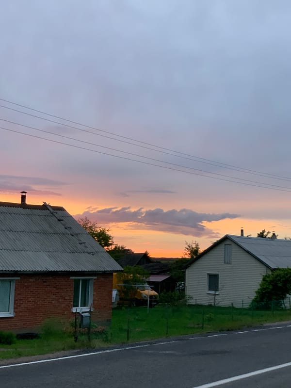 Sunset over a Belarusian village, chocolates on the side