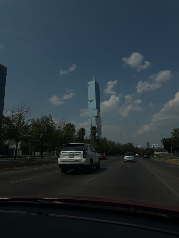 BBVA skyscraper observed from roadway in Tlaxcalancingo, Mexico