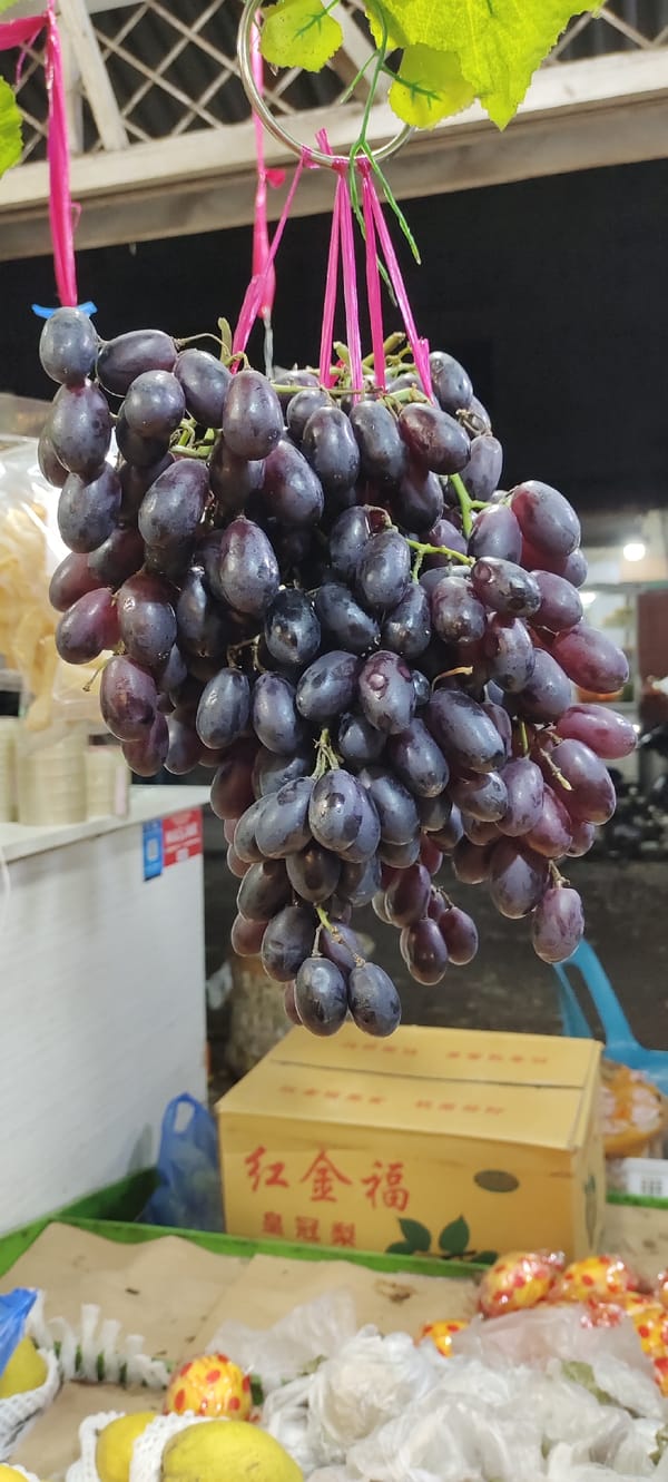 Fruit stall in Lhokseumawe packed with fresh produce
