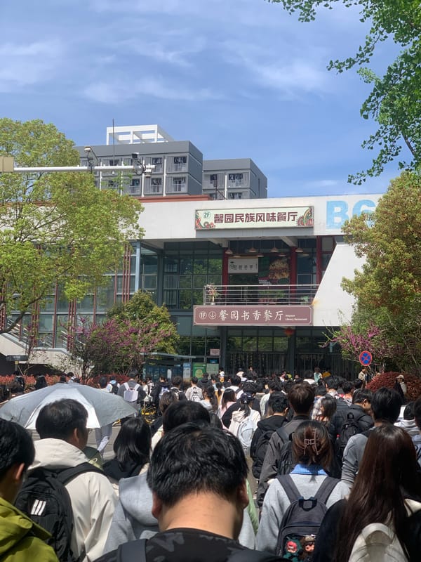 Crowd gathers outside restaurant in Jiangning District, China