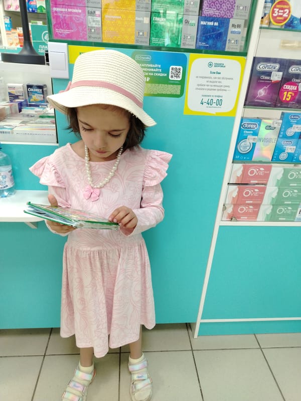 Morning scenes in Noviy: girl reading, lily flowers blooming
