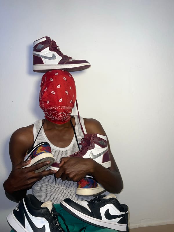 Bandana-wearing individual photographed with sneaker hashtag in Jos