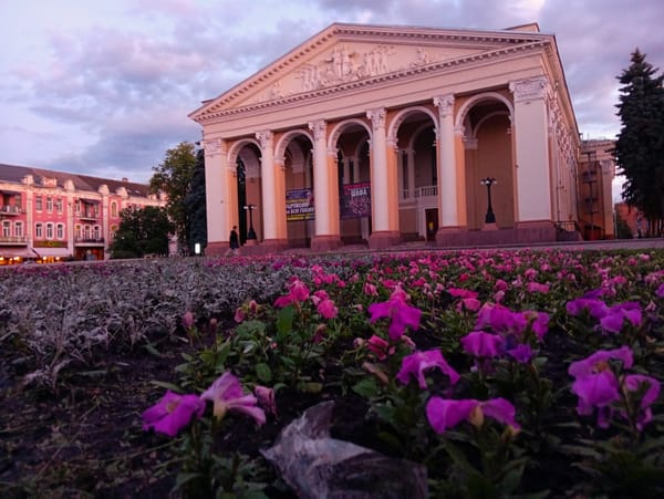 Evening stroll documented through central Poltava during dramatic twilight