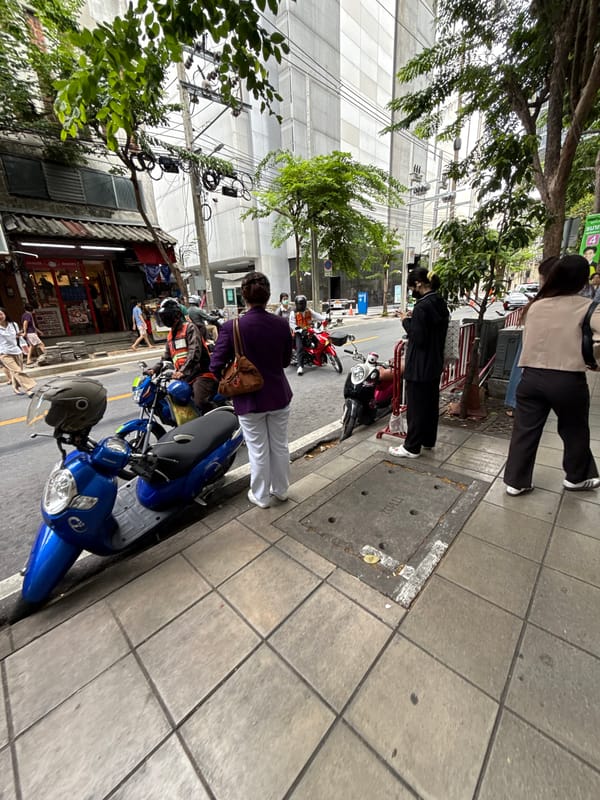 Bangkok streets: glass towers, a CC Tower landmark, and urban decay