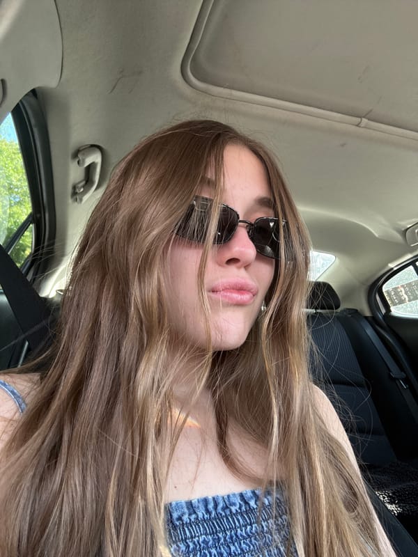 Woman in sunglasses observed in car in Mexico City