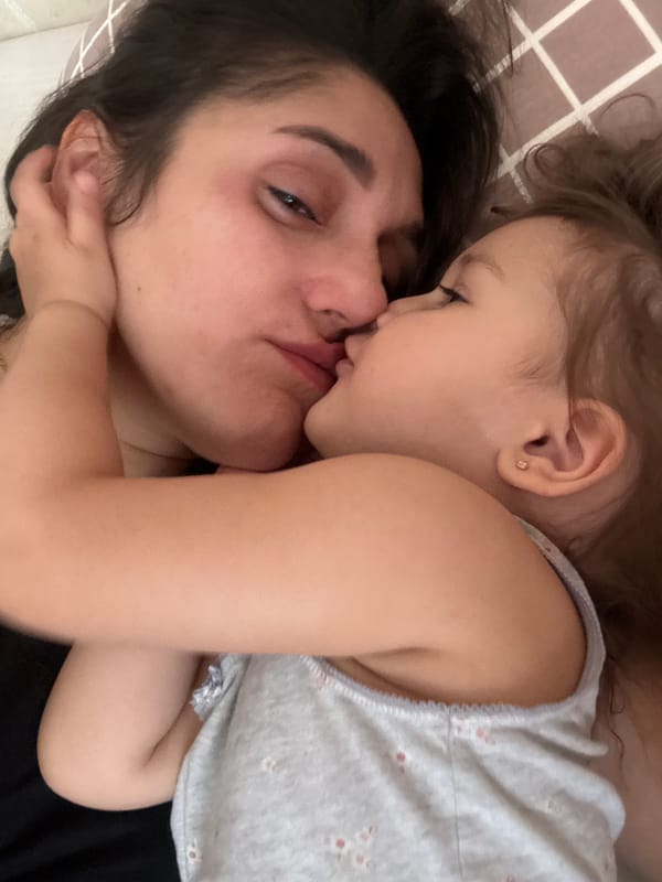 Mother and child share tender morning moment in Tobolsk