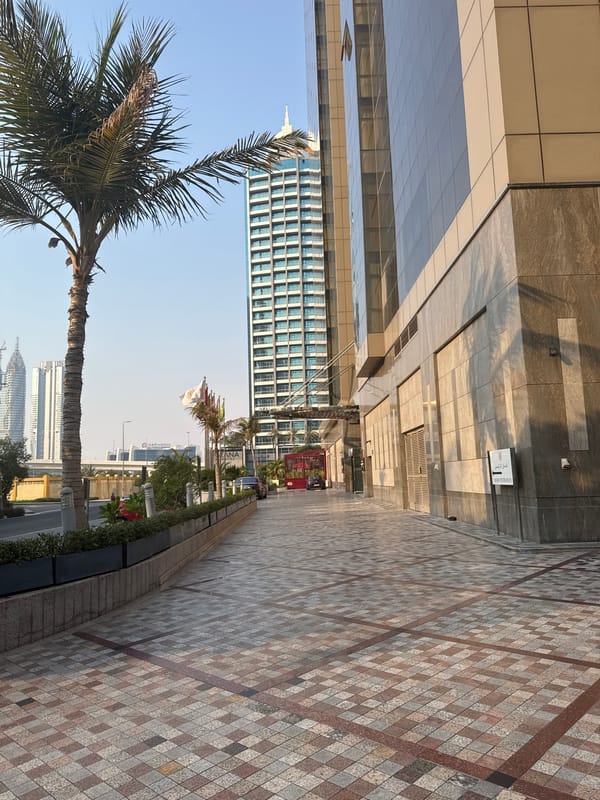 Street-level look at a modern Dubai business district