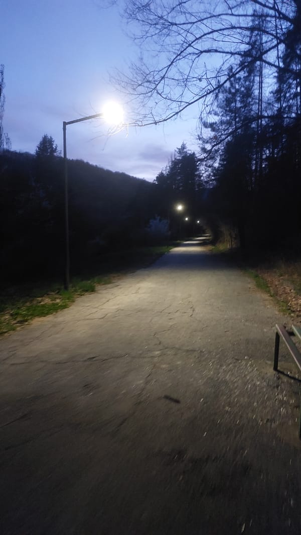 Illuminated pedestrian path captured at night in Gabrovo, Bulgaria