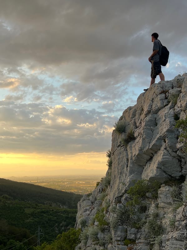 Person spotted resting at cliff edge near Asenovgrad, Bulgaria