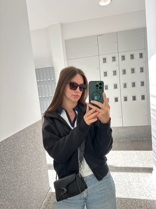 Person takes iPhone selfie in mirrored space in Montenegro
