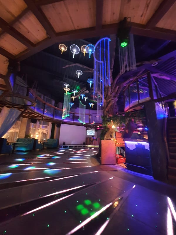 Evening scene captured at entertainment venue in Liski, Russia